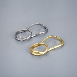 This exaggerated geometric ring from Europe and America features a gold and silver glossy double-ring ring with an opening design that can be adjusted in an ins style
