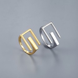A neutral and cold style open E-letter simple ring with gold and silver hollowed-out rings, featuring a European and American personality design and an ins style