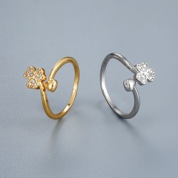 The lucky four-leaf clover diamond-encrusted zircon CZ ring for women in Europe and America is simple, light and luxurious, with a unique and sweet opening design